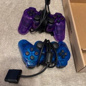 Vibrant Blue and Purple Wired Game Controllers